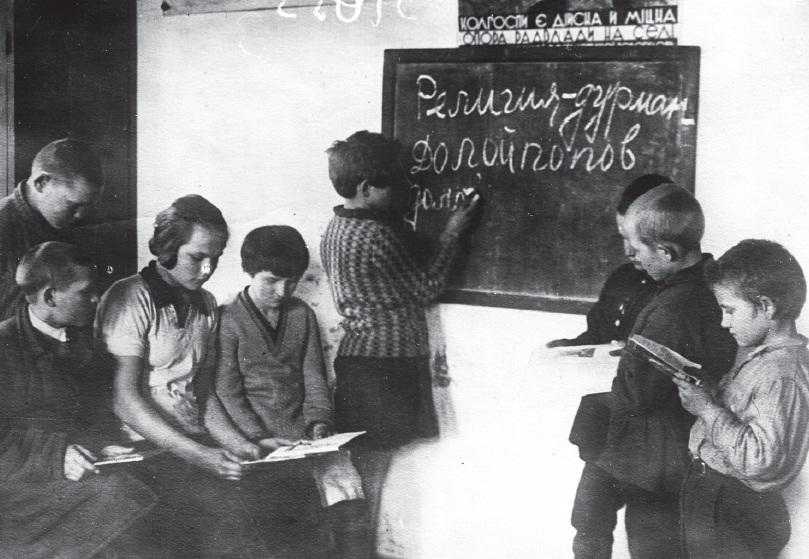 Anti religious indoctrination of children in Kharkiv, 1932-1933. “Religion is a drug. Down with priests”[809×559].