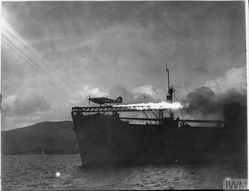Test launch of a Hurricane from a CAM (Catapult Armed Merchant) Ship at Greenock with rocket assistance, circa 1941. [800 × 614]