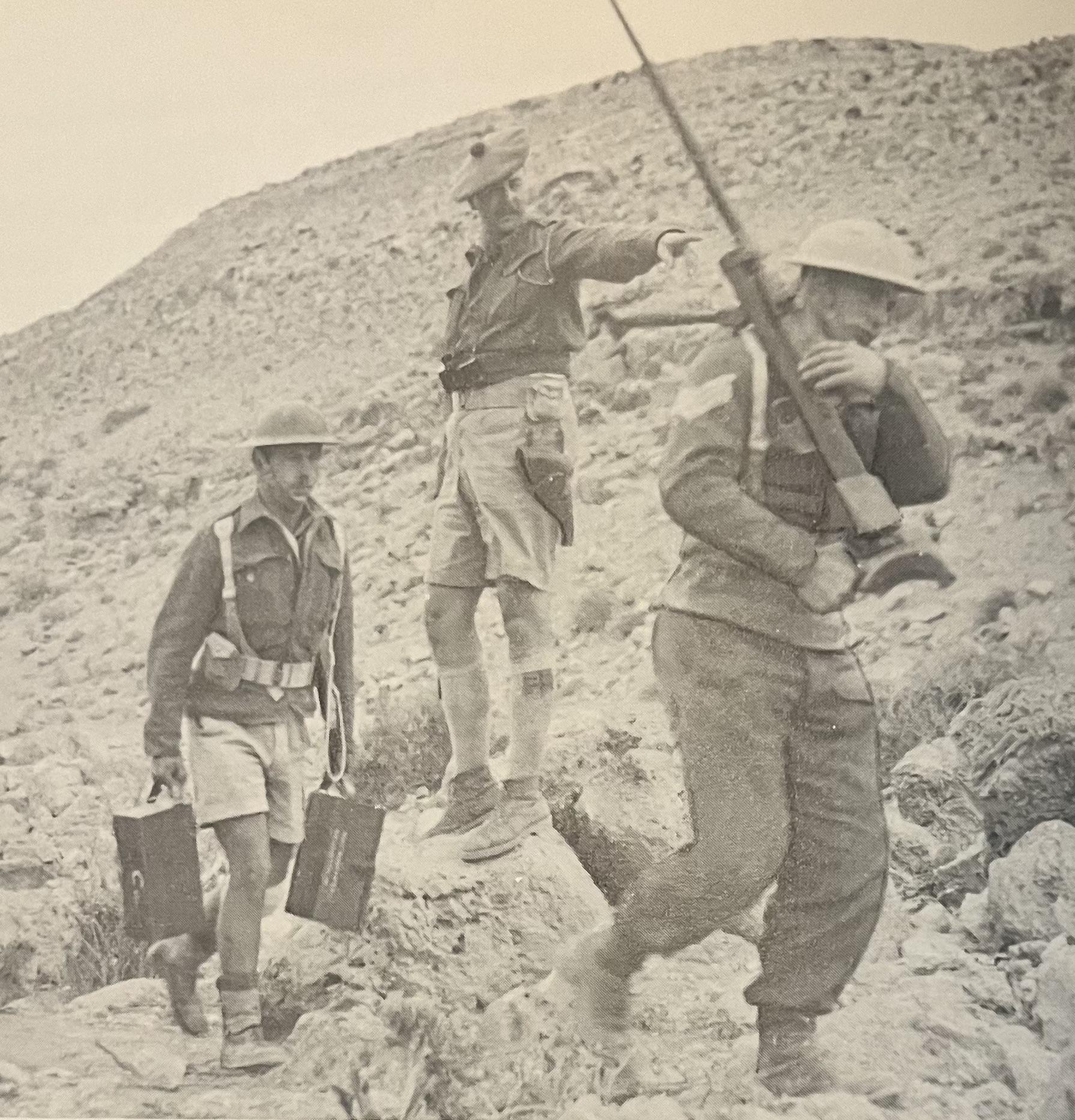 Two men of the Cape Town Highlanders are ordered by an officer to set up an Anti-Tank rifle. North Africa, 1942. [1790×1864]