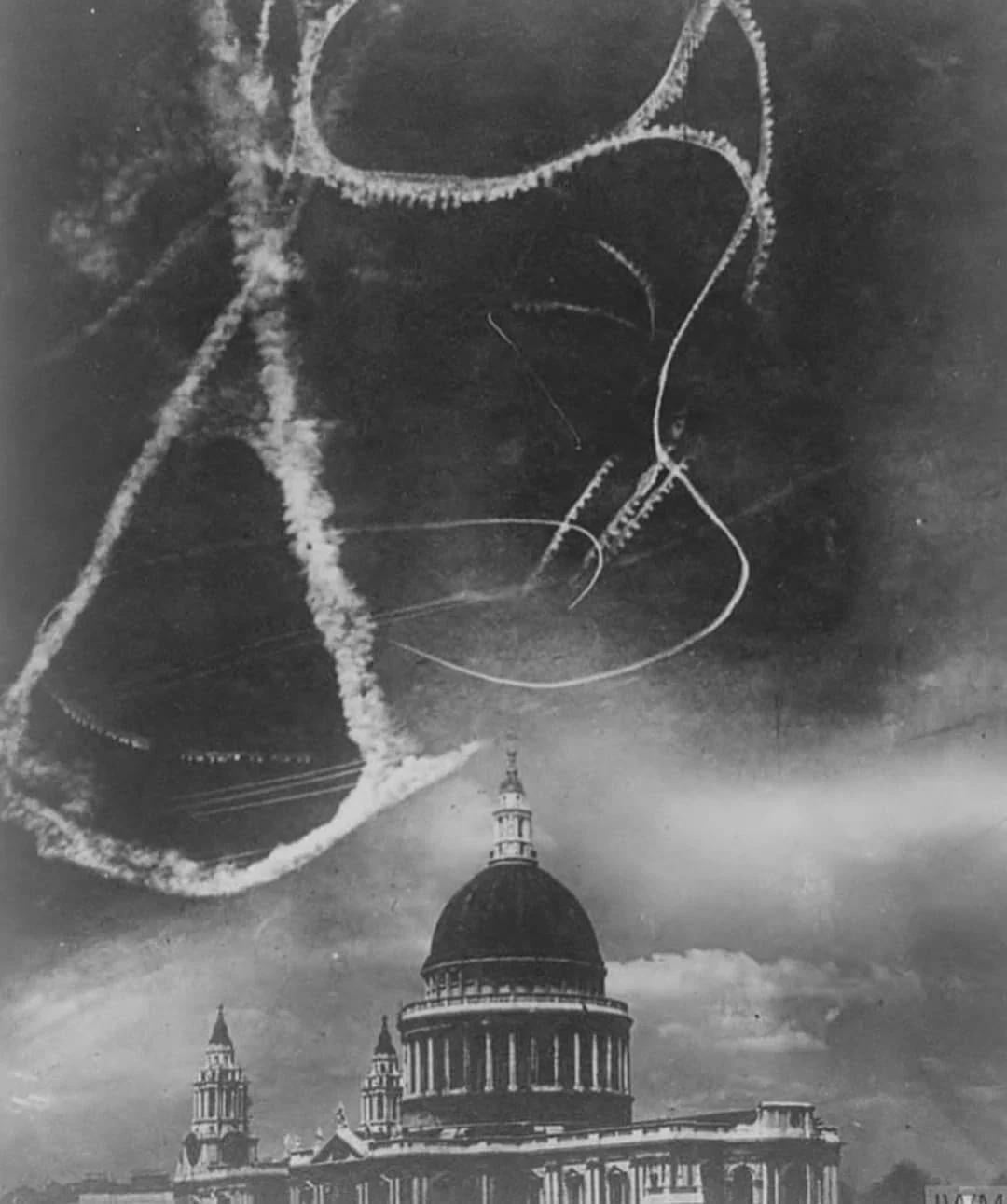 RAF and Luftwaffe fighters dogfighting above St. Paul’s Cathedral during the London Blitz, 1940. [1080×1291]