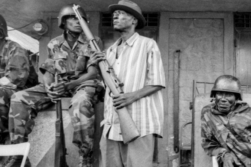 Rebels from the National Revolutionary Front for the Liberation and Reconstruction of Haiti – with M1 Garand semi-automatic rifles, during the Haitian coup d’état of February 22nd – 29th, 2004. [830 x 552]