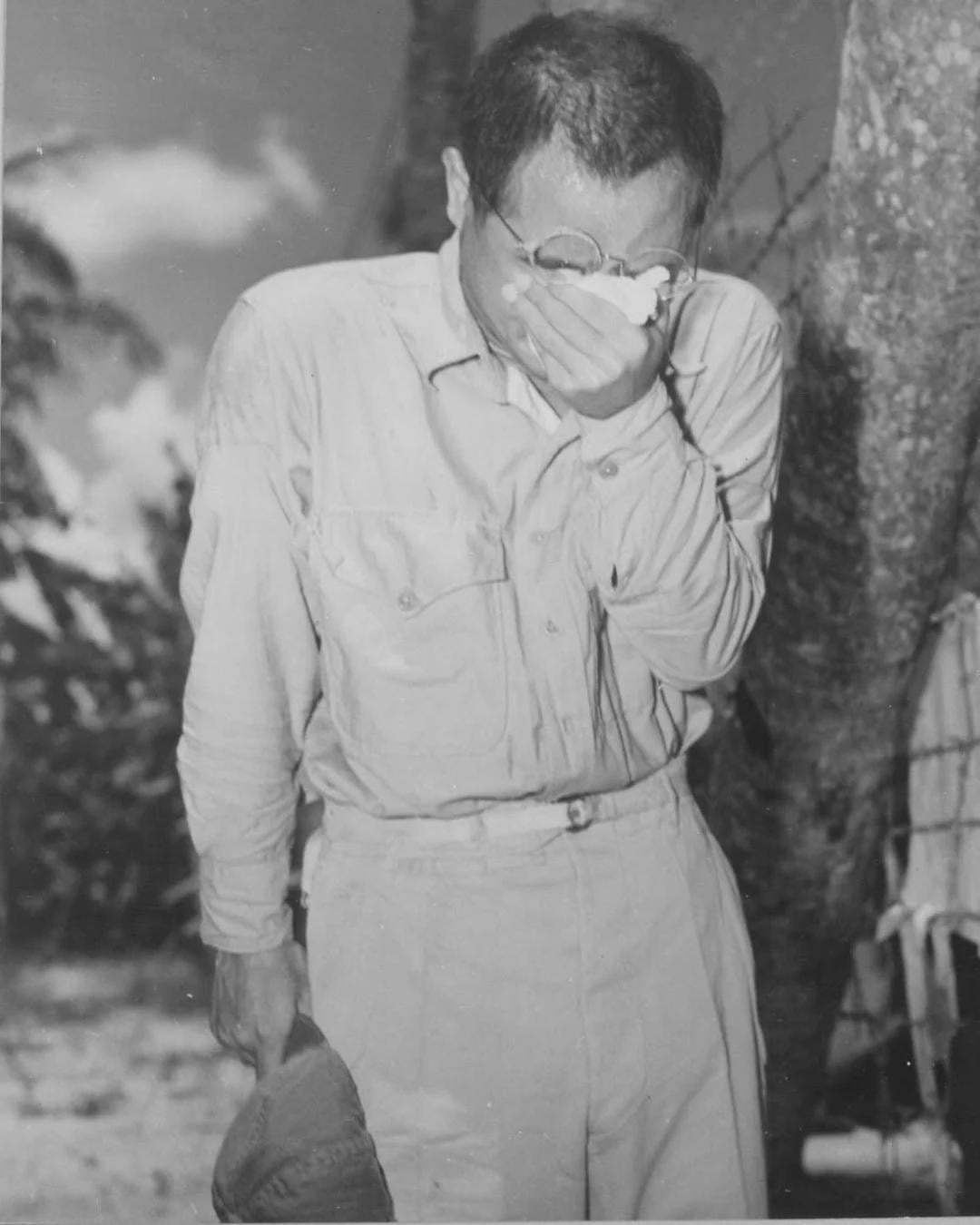 A Japanese prisoner of war at Guam, Mariana Islands, covers his face as he hears Japanese Emperor Hirohito making the announcement of Japan’s unconditional surrender on September 2, 1945. [1080×1350]