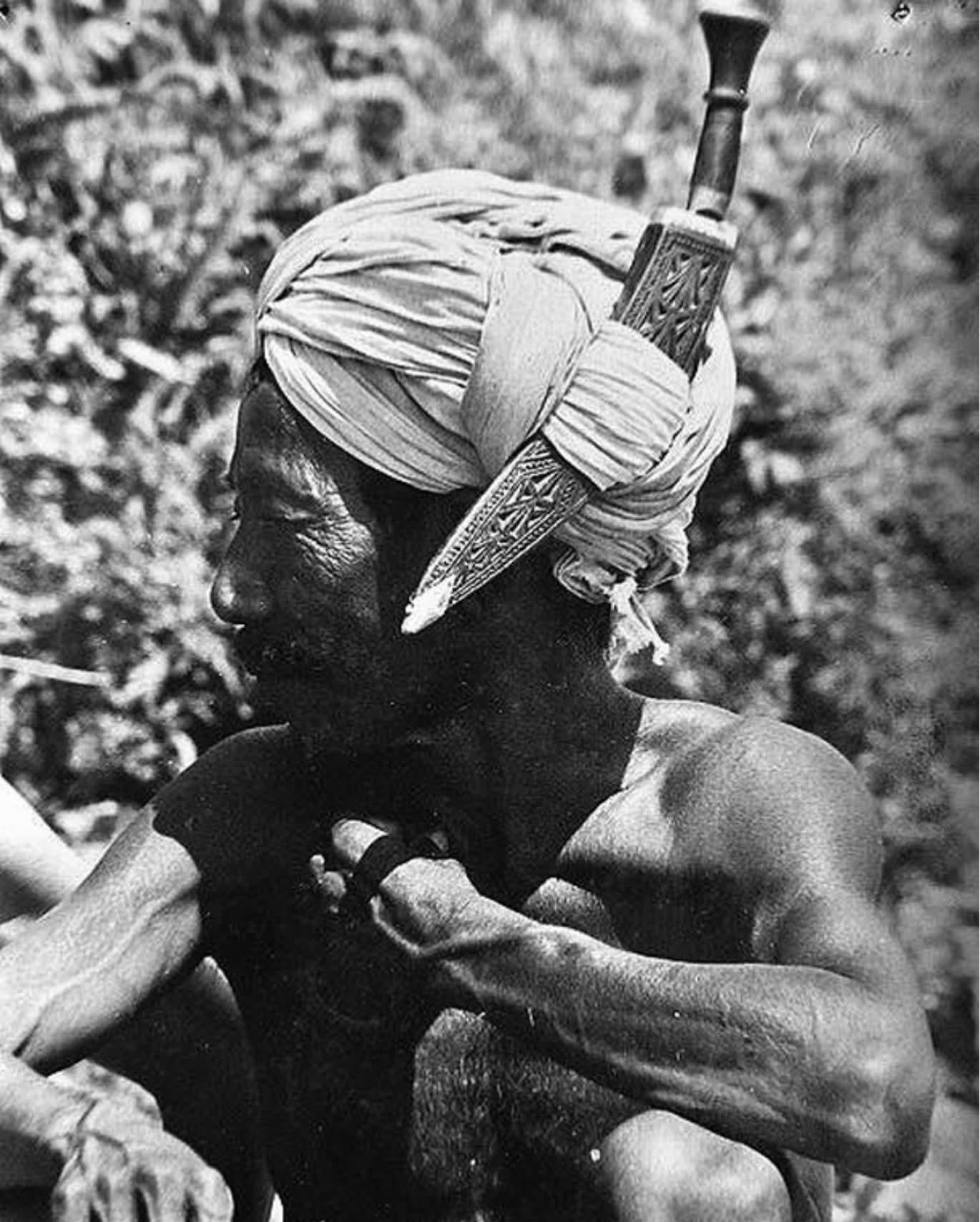 Nepalese man with tucked khukri in his truban, 1967 [1307×1708]