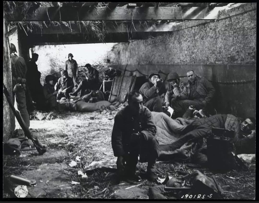This week in 1944, men of the 4th Infantry Division’s L Company in the 22nd Regiment took a brief reprieve in a barn near Utah Beach. Regimental commander Captain Edward L. Gatto (in the center without a helmet) briefed his men in the courtyard. [1080×844]