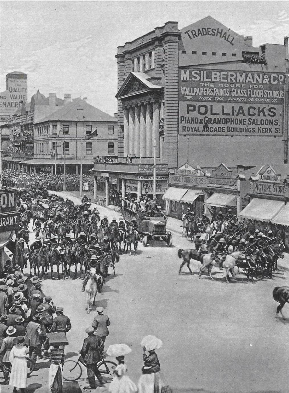 South African Policemen escort arrested racist-leftist popular front strike leaders to prison after a raid was performed on the Johannesburg Trades Hall. Friday 10 March 1922, South Africa [1014×1379]