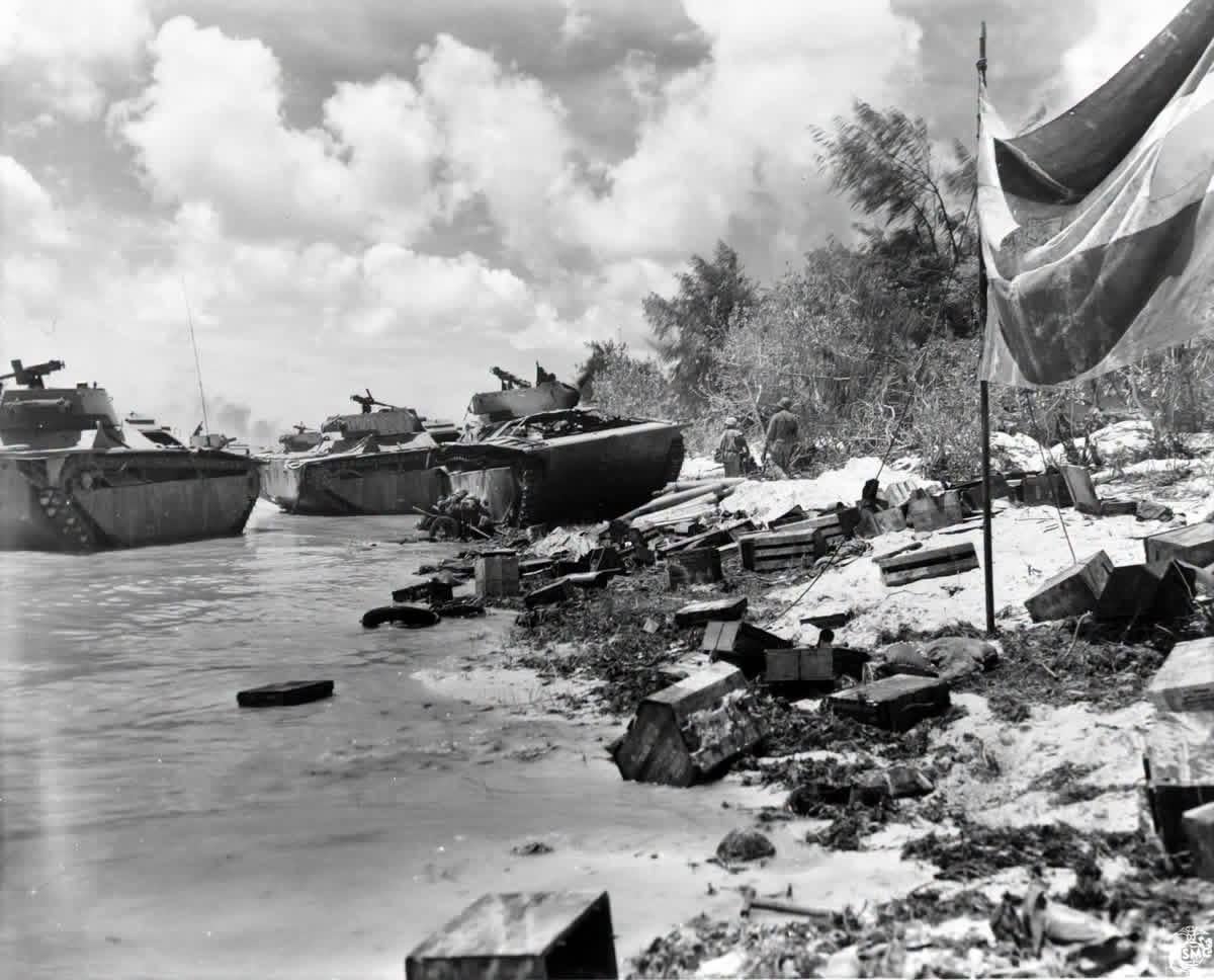 View of wrecked LVTs and other debris on one of the Saipan invasion beaches the day after “D-Day”, June 16, 1944. [1200×968]