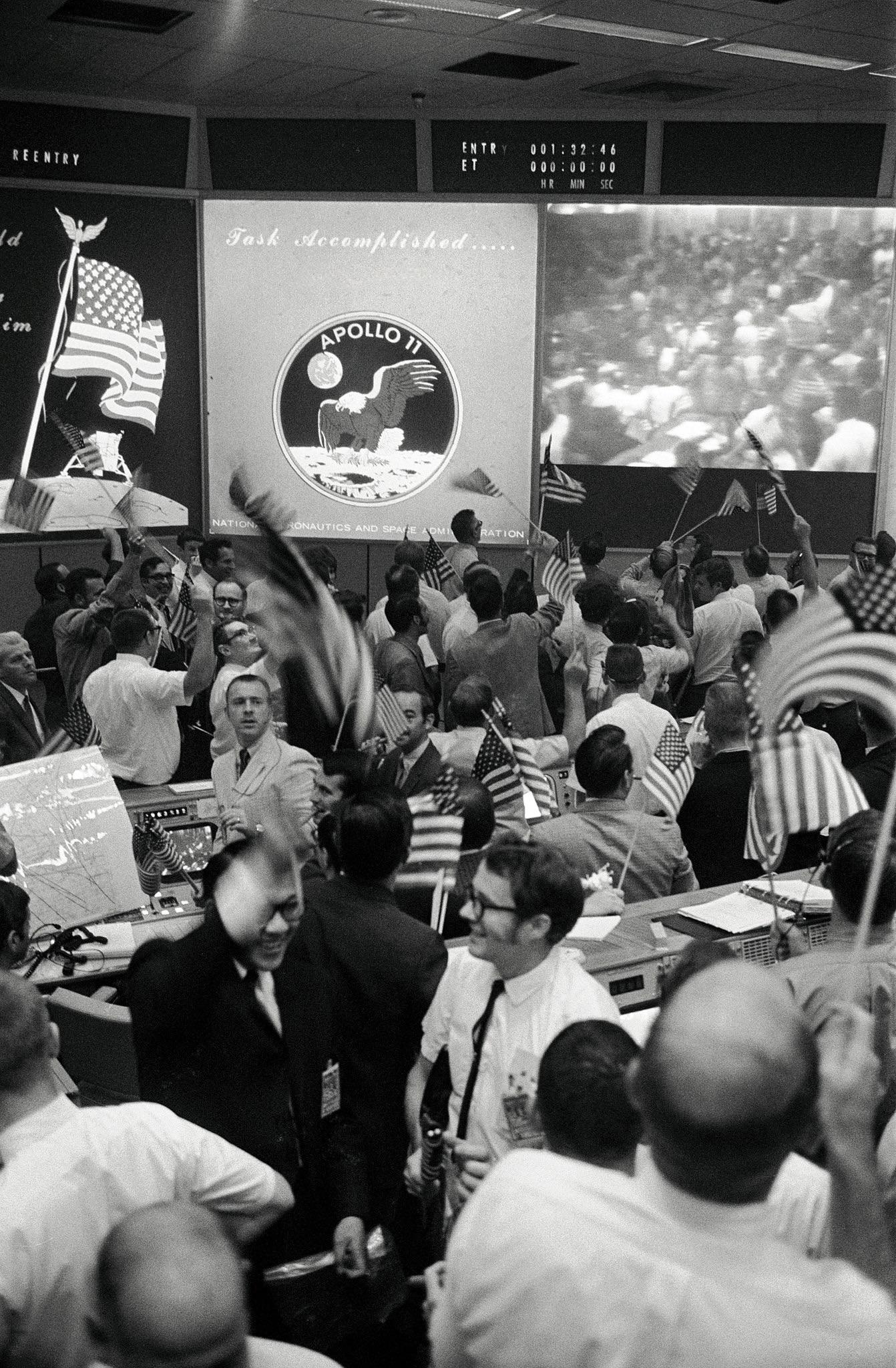 Mission Control celebrating after the conclusion of the Apollo 11 Lunar Landing Mission. (1969) [1342×2048]