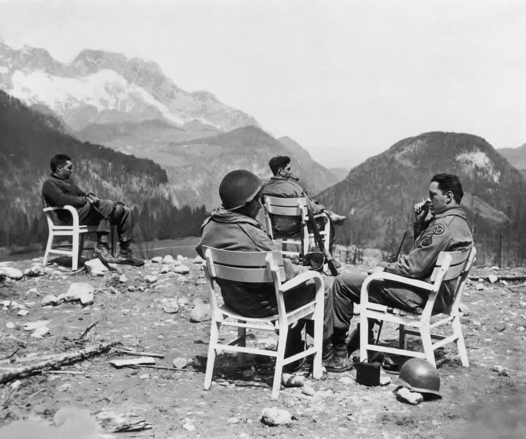 A group of GIs take a moment to relax at Adolf Hitler’s former vacation retreat in Berchtesgaden, Germany 1945. [1080×902]