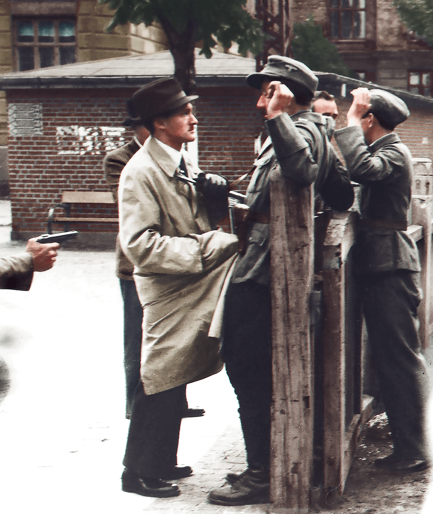 Danish resistance fighters holding up and disarming German soldiers, Copenhagen. (1945) colourized [1394 × 1656]