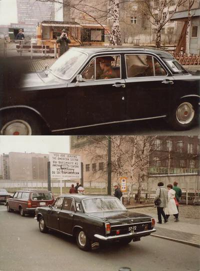 Soviet Army officers in a GAZ-24 Volga sedan who were visiting West Berlin, passing through Checkpoint Charlie back into East Berlin (1982) [400×542]