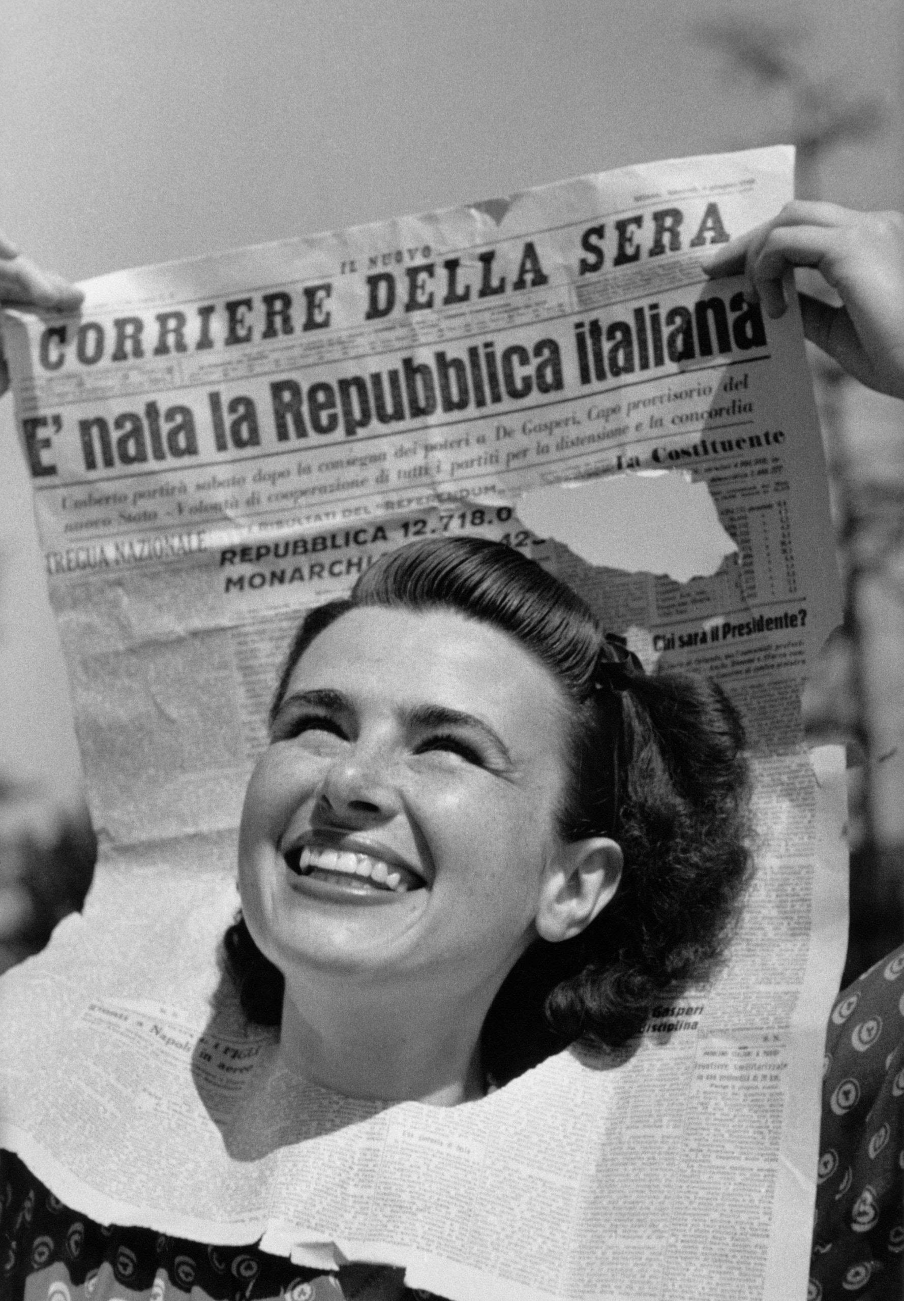 “The Italian Republic is born”, a woman puts her head through a cut-out newspaper with the results of the post-WW2 Italian state referendum, Milan, June 6th 1946 [1778×2150]