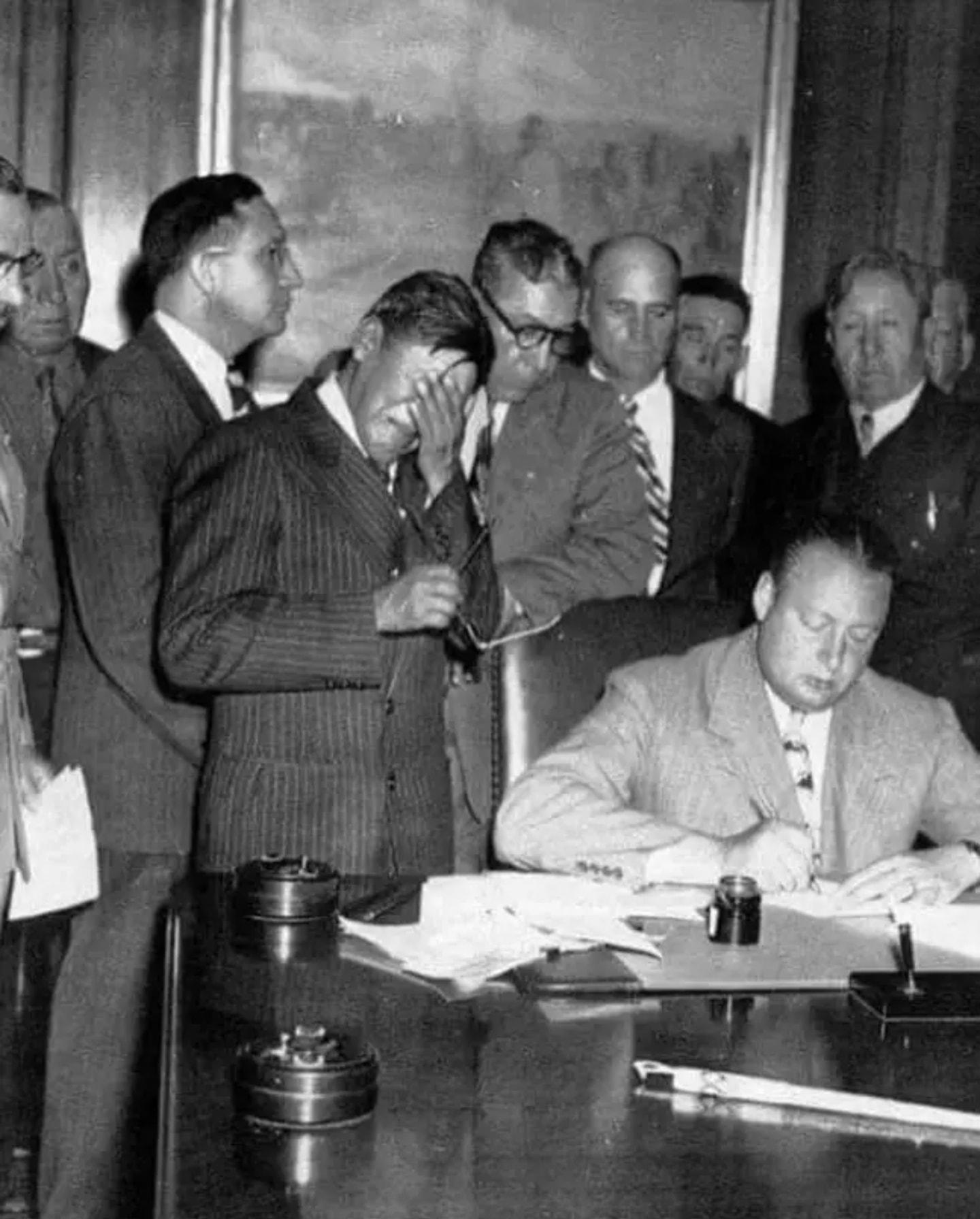 Tribal rep George Gillette crying as 154,000 acres of land is signed away for a new dam (1948) [1440×1791]