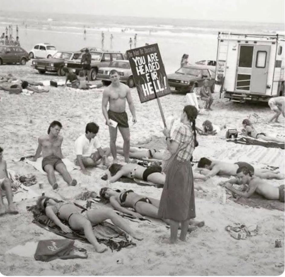 A woman protests against the wearing of bikinis, in Daytona Beach, Florida, 1981 [1080×1350]