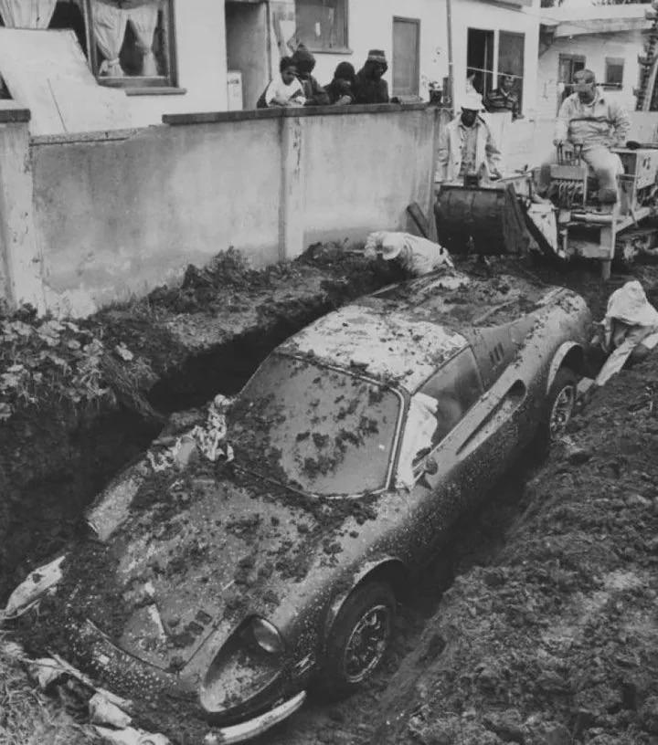 Two kids discovered a Ferrari Dino buried in their backyard while playing, 1978. [720×816]