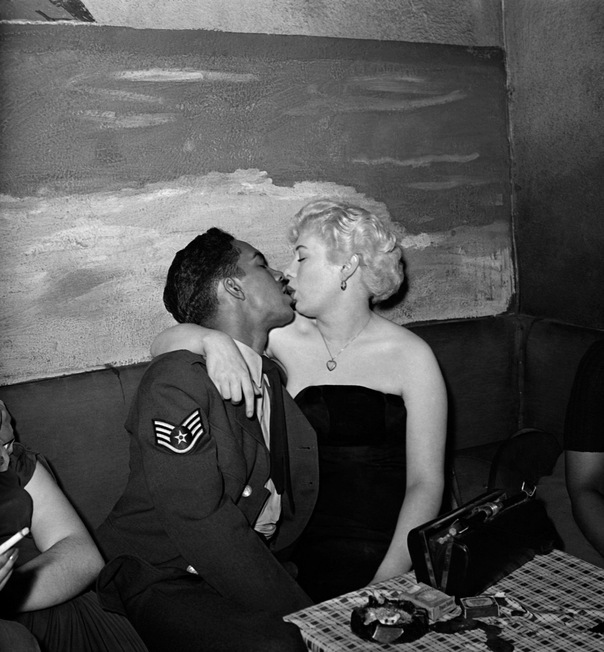 Mix couple at Sunset Club in London, England. One of the places such couples could go together in the open. African american GI were frequent visitors.  December of 1951.[2480×2676]
