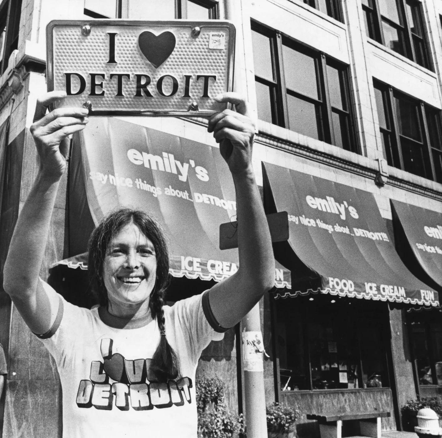 Detroit civic booster Emily Gail outside her downtown store promoting the ‘Say Nice Things About Detroit’ campaign, early 1980s [1427×1416]