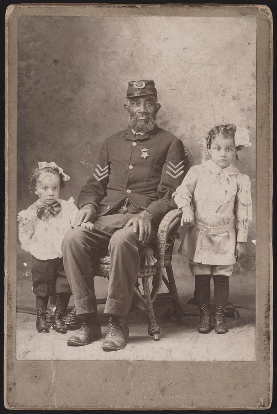 Union war veteran posing with his 2 grandchildren, circa 1890 [900×1342]