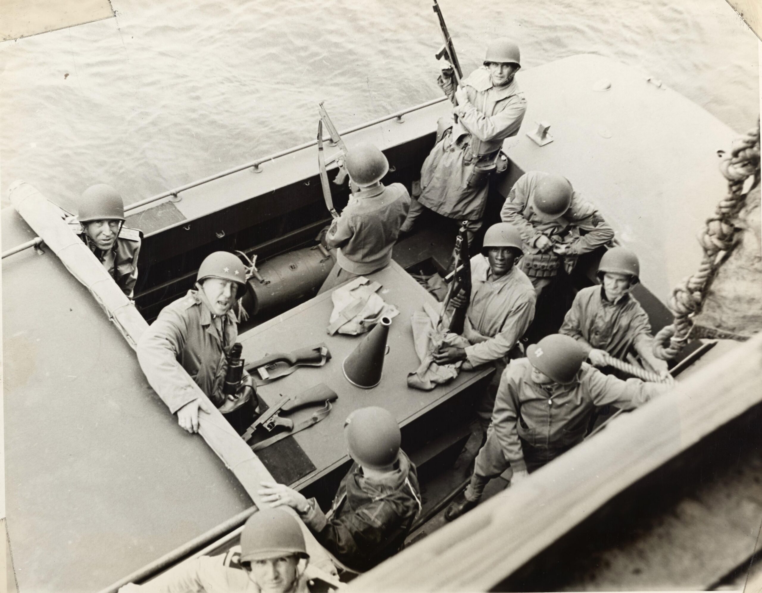 General George S. Patton preparing to go ashore in North Africa. 1942. [4432×3448]