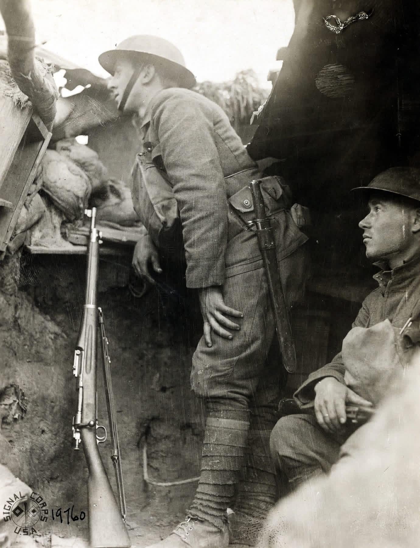 Private John Thiacos and Private Guy Slaymen, of Company E, 126th Infantry Regiment, 32nd Division, manning an observation post, Alsace, June 1918. (Photo courtesy of the National Archives) [1380×1800]