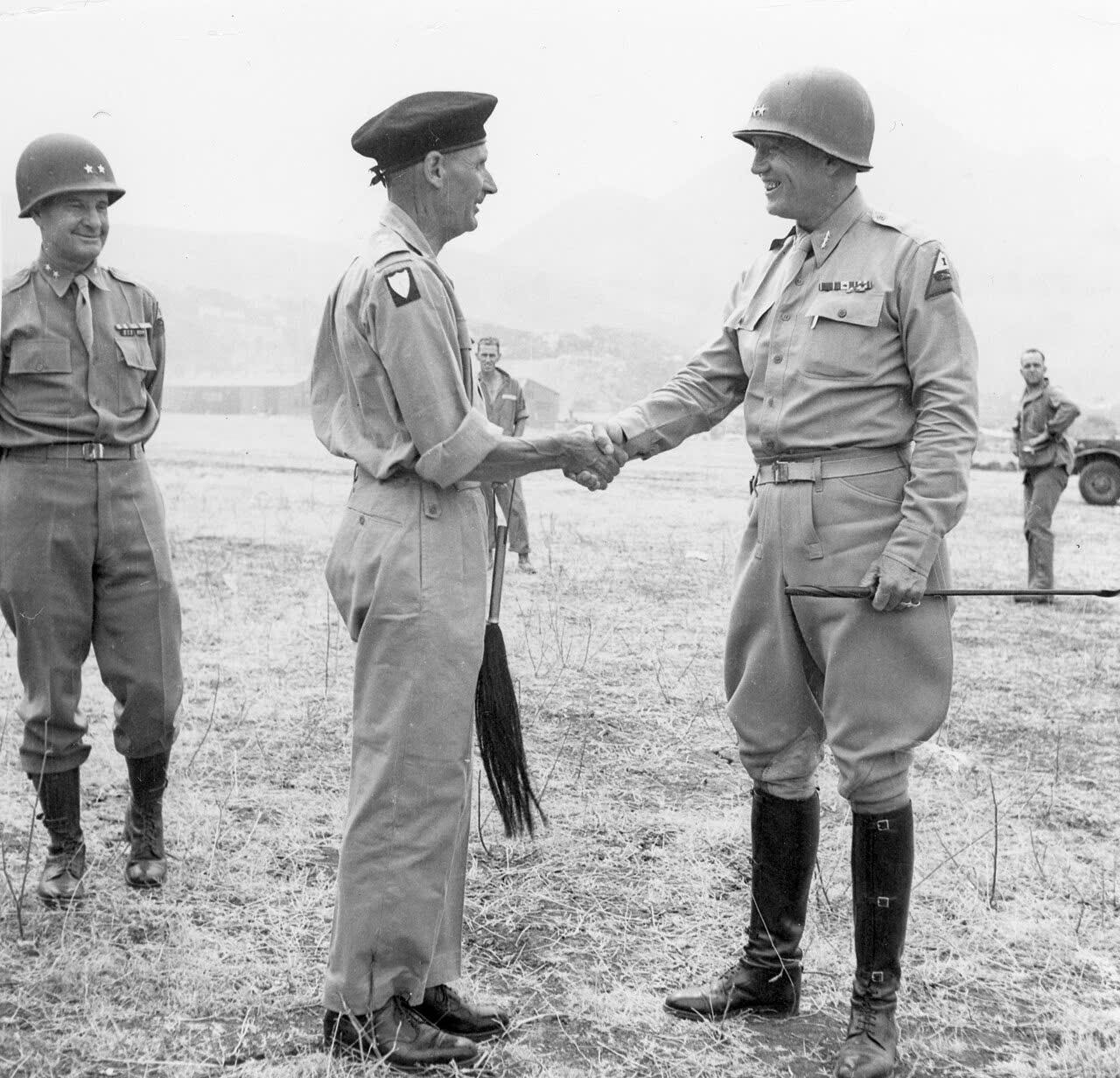 General Bernard Montgomery bids farewell to Lieutenant General George S. Patton at an airfield near Palermo, Sicily, Italy, after Montgomery’s visit, 28 July 1943. [1280×1232]