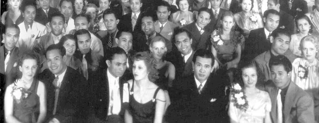 Dance hall, 1930s. Filipino men dating and dancing with white women was a contributing factor in riots and violent assaults targeting Filipino American workers [725×279]
