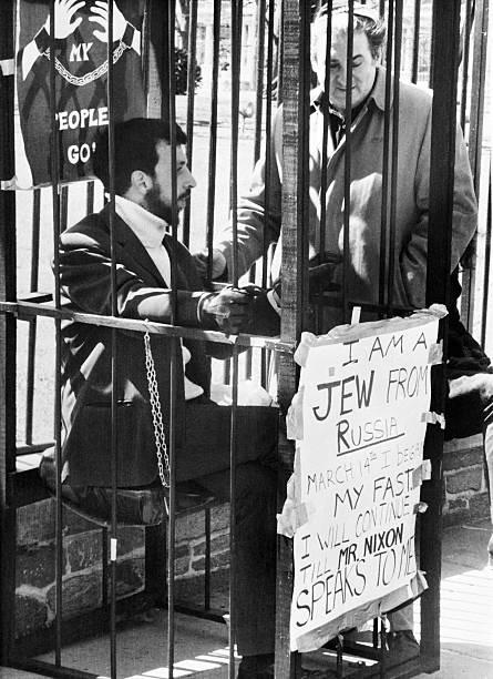 Yosef Schneider locks himself in a cage and fasts outside the White House in protest of the treatment of Soviet Jews, March 1971[445×612]