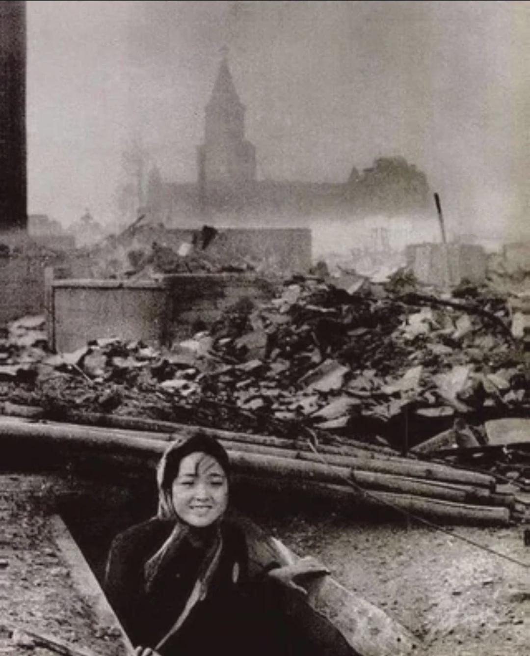 A young woman who survived the atomic bombing of Nagasaki , August 1945. [1080×1336]