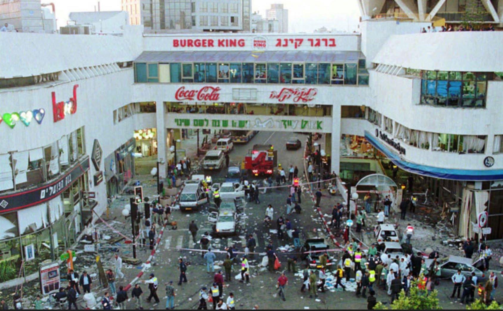 The aftermath of a Palestinian suicide bombing attack in Tel Aviv. On March 4 1996, a Palestinian suicide bomber detonated a 20-kg bomb deliberately packed with nails to maximize casualties, murdering 13 people and injuring 130, many of whom were children in their Purim holiday costumes. [1687×1046]