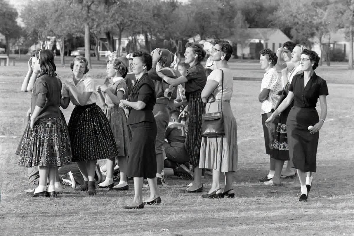 Spectators at a 6th grade football game between Casa View Elementary and Reinhardt Elementary, Texas, 1956. Photo by Joe Scherschel for LIFE Magazine. [1200×799]
