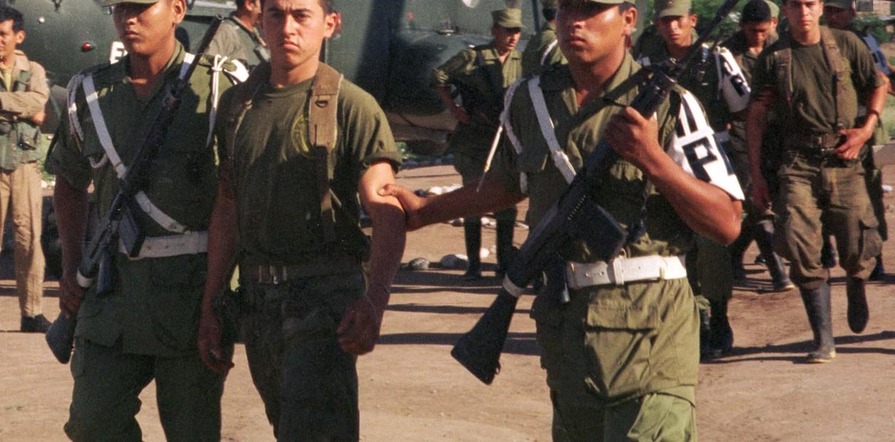 Ecuadorian POWs are escorted by their Peruvian captors during the 1995 Cenepa War. [1256 x 620]