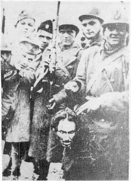 Ustase soldiers holding the severed head of a Serbian Orthodox priest. Independent State of Croatia. Early 1940s. [432×599]