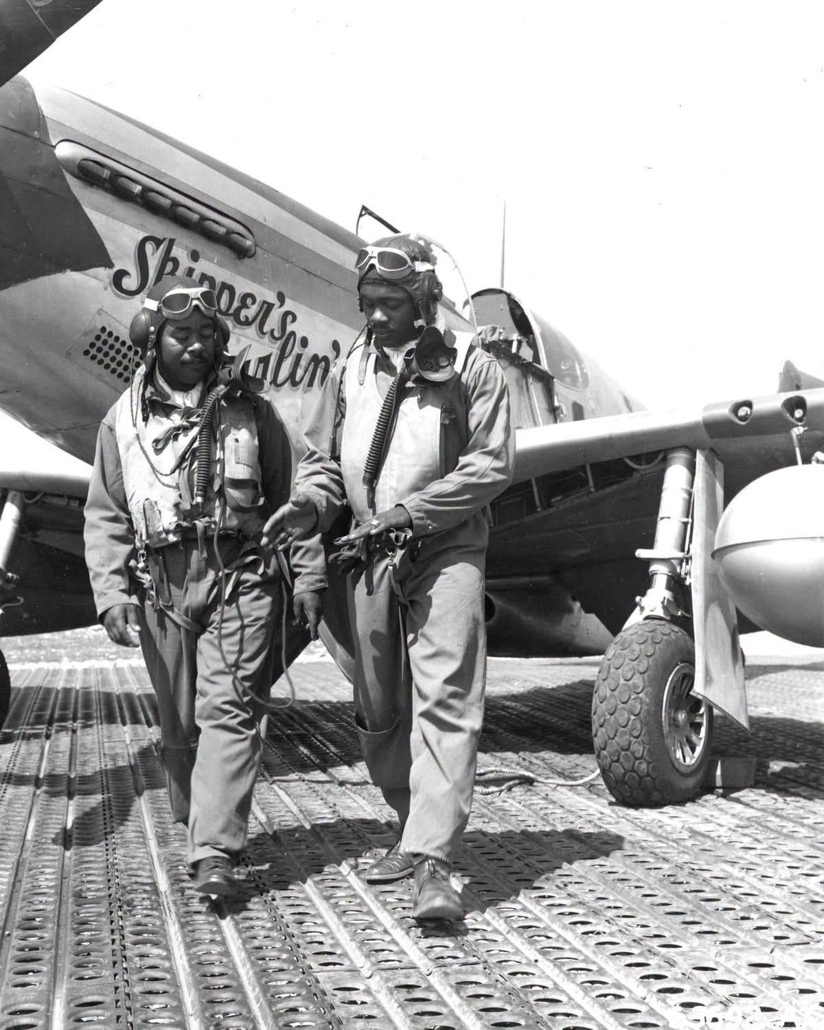 Captain Andrew D. Turner, 100th Fighter Squadron Commanding Officer, and Lieutenant Clarence P. “Lucky”Lester on the Marsden Matting of Ramitelli Airstrip, Italy on August 1, 1944. [1200×1500]