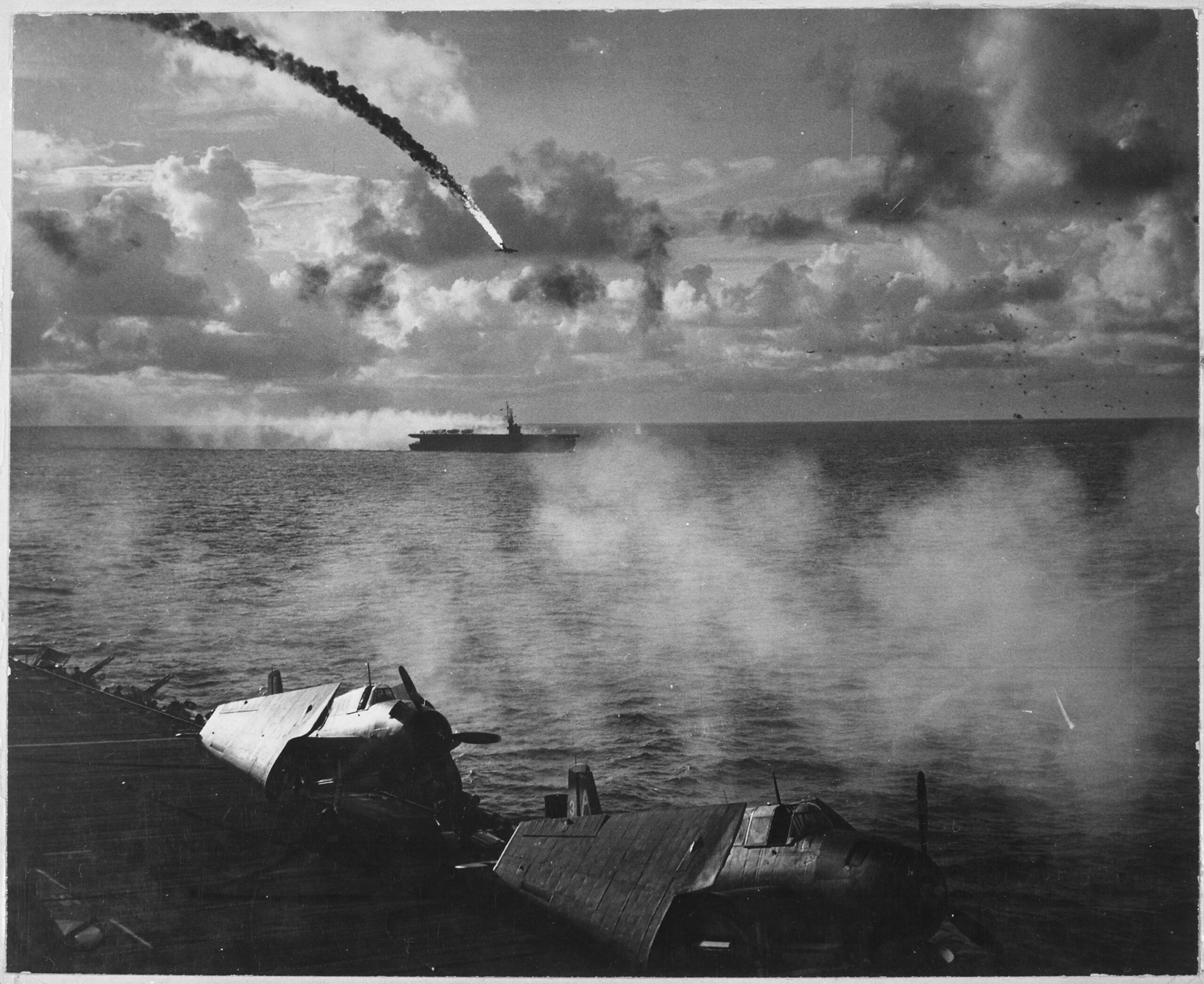 A Japanese plane is shot down while attacking the USS Kitkun Bay near the Mariana Islands. June 1944. [3000×2452]