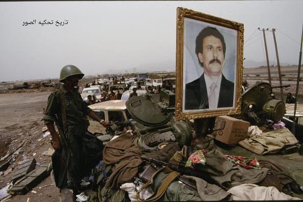 Soldier from the Yemeni government forces – stands on a tank – with the portrait of the President of Yemen, Ali Abdullah Saleh, during Yemeni Civil War, c. May – July 1994. [594 x 396]