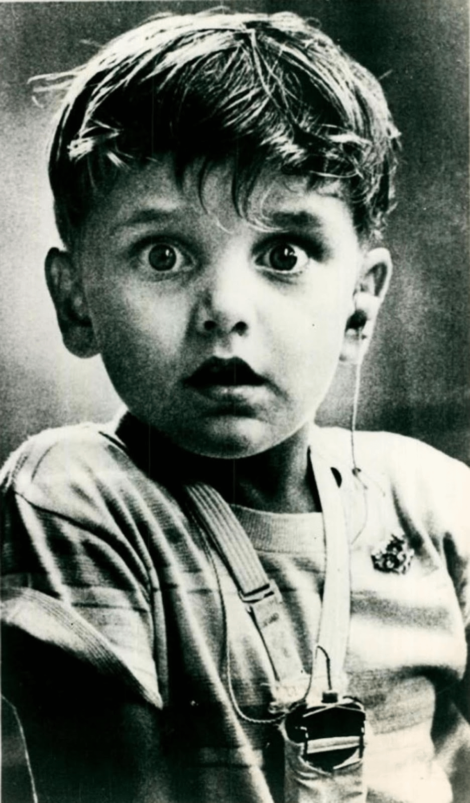 A young boy, Harold Whittles, hears for the very first time after being fitted with a hearing aid, 1974 [936×1600]