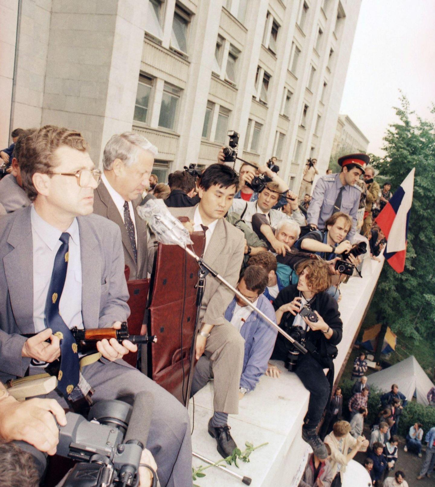 Boris Yeltsin addressed crowds outside of the parliament building in Moscow during an act of public defiance that effectively dismantled the authority of communist hardliners after a failed pro-communist coup, and accelerated the formal dissolution of the USSR four months later. (1991) [1440×1612]