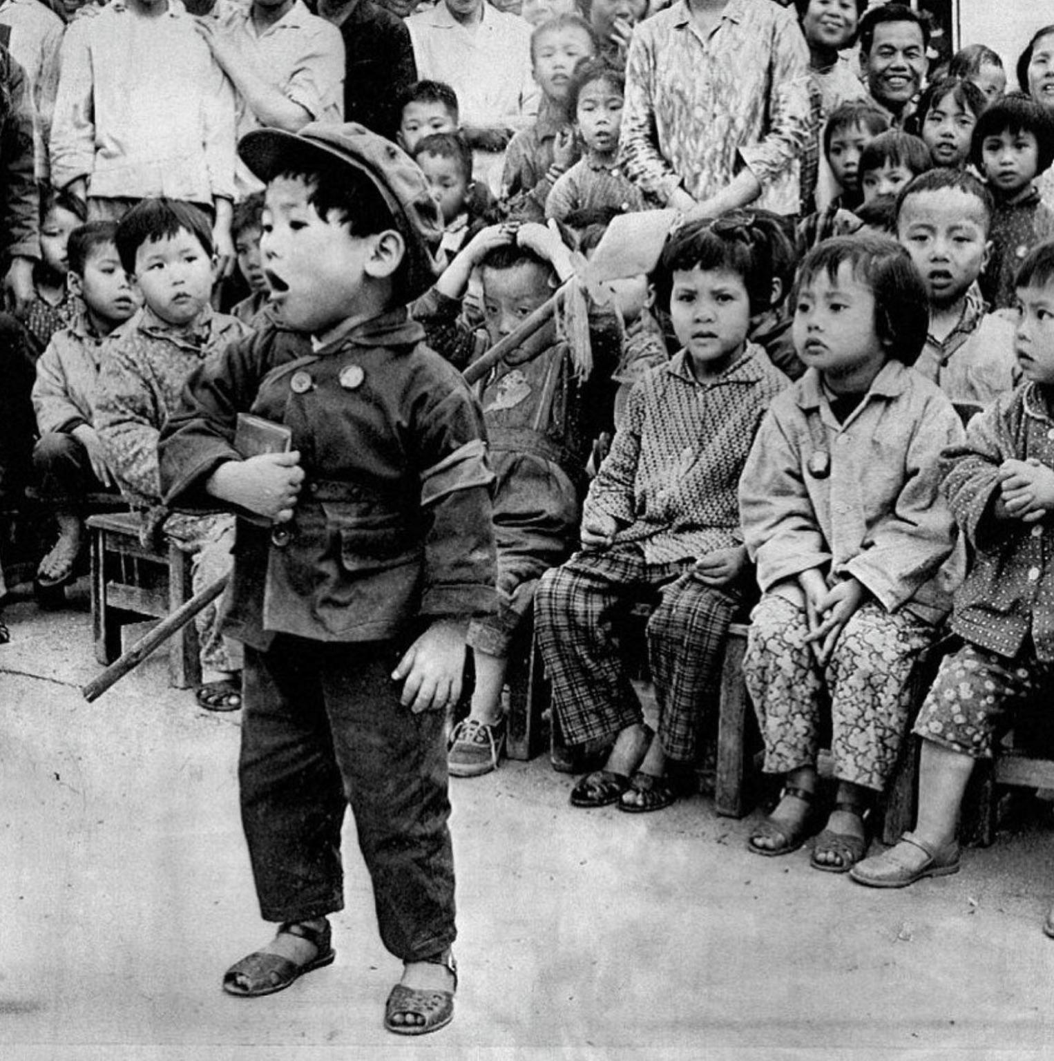 Children swearing loyalty to Mao Zedong and the Little Red Book during the Cultural Revolution, 1971 [1526 × 1536]
