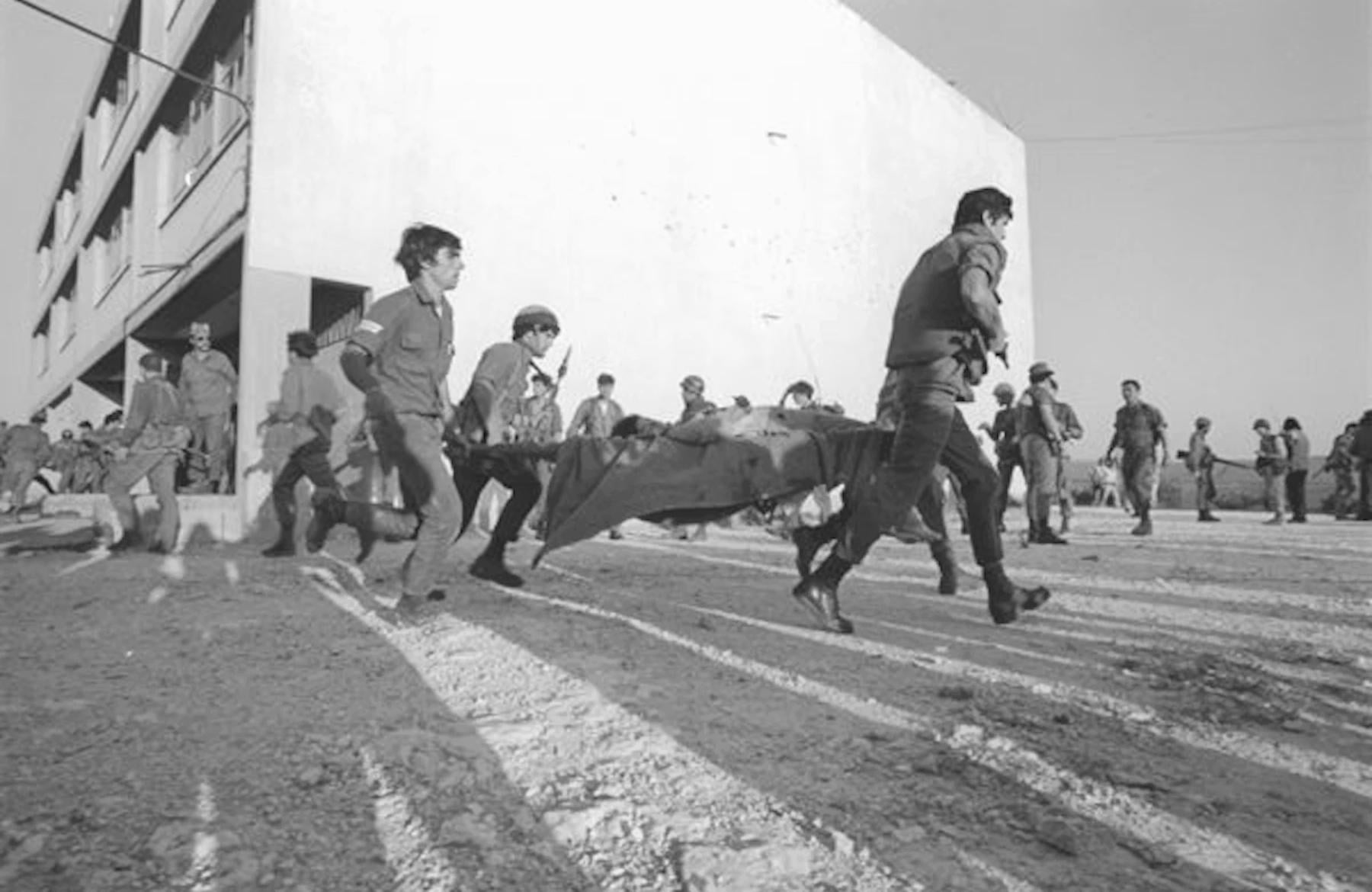 Evacuation of hostages from the 1974 Ma’alot Massacre, in which Palestinian terrorists seized an Israeli school, murdering 22 children and a family of three in their home. [1800 x 1170]