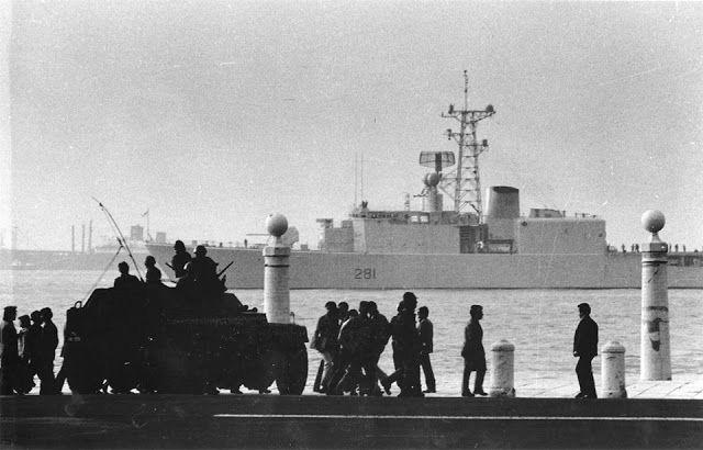 The Royal Canadian Navy’s Tribal-class destroyer, HMCS Huron (G24), off the coast of Portugal during the Carnation Revolution on April 25th, 1974. [640 x 410]