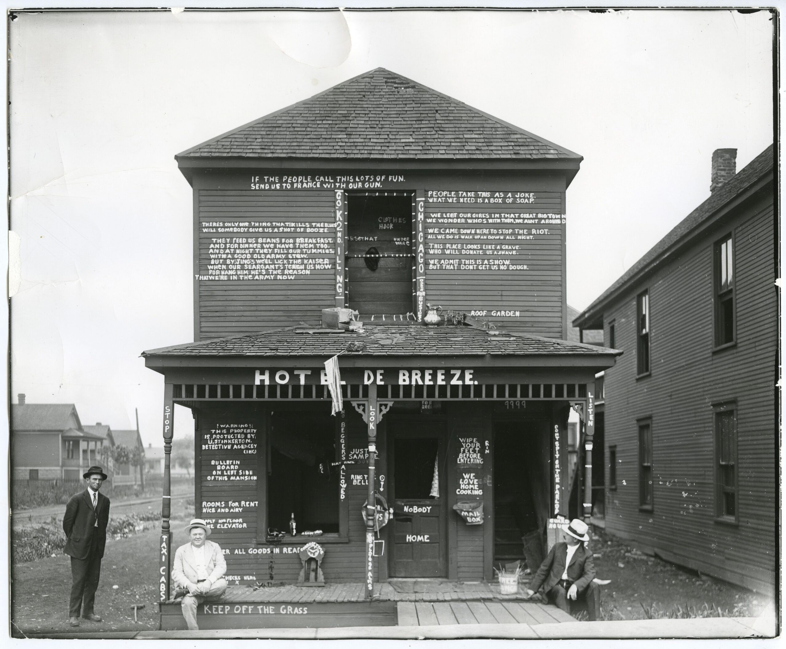 Hotel DeBreeze, 1917. Abandoned house covered with graffiti by Co. K, Second Illinois National Guard. Destruction likely occurred during the East St. Louis race riot.[6090×5025]