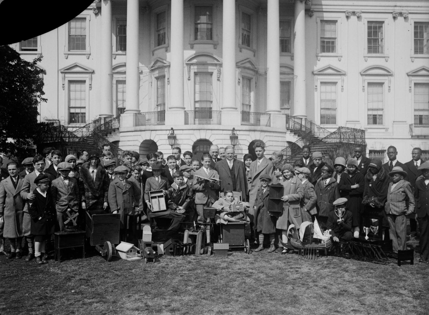 President Herbert Hoover standing with contestants and winners of a national woodworking competition sponsored by the National Committee on Wood Utilization. (1930) [1383×1016]