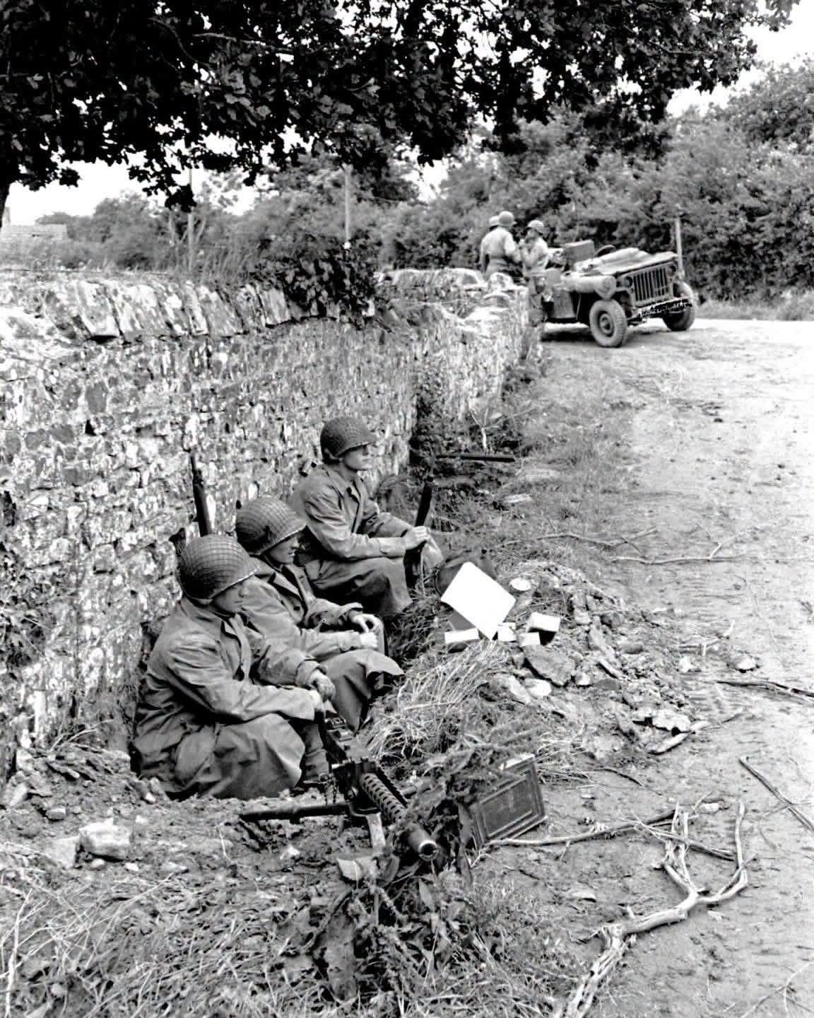 US Browning M1919A4 machine gun team rests by a stone wall outside of La Haye-du-Puits, Normandy – July 1944. Ralph Morse Photographer, LIFE Magazine [1152×1140]