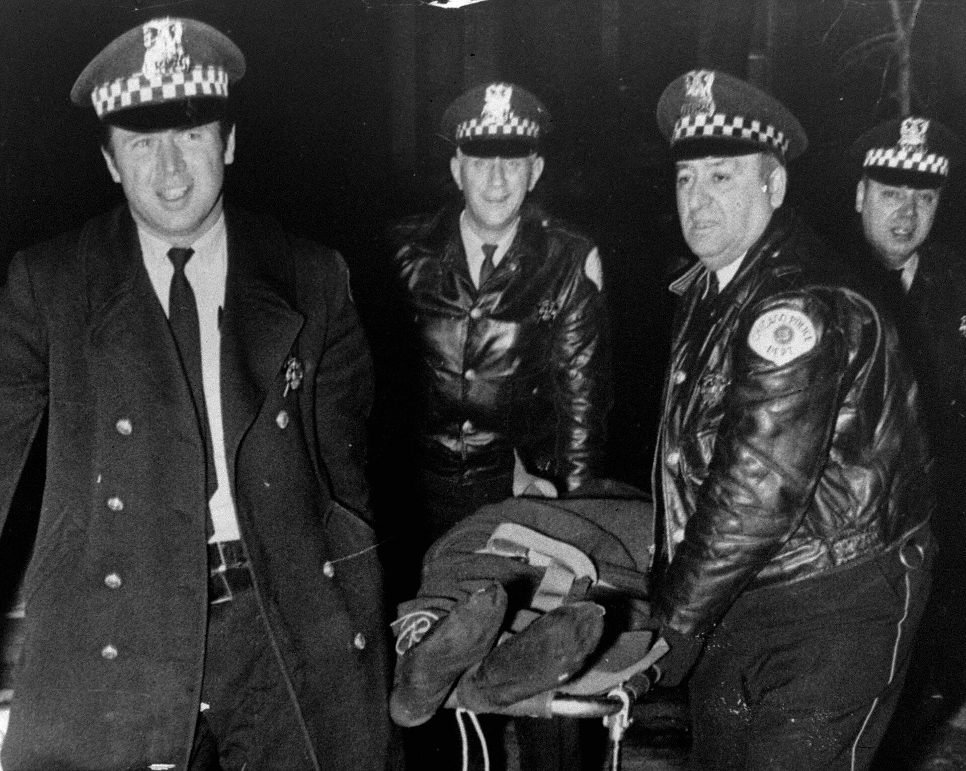 Chicago police smile while carrying Black Panther Party chairman Fred Hampton’s corpse after fatally shooting him in his sleep 1969 (960×767)