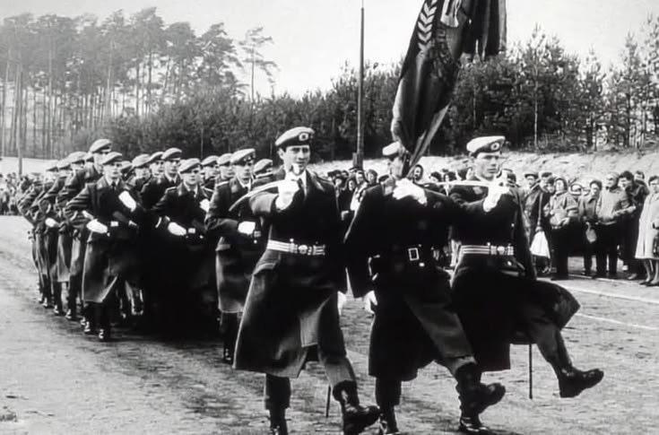 Paratroopers from the 5th paratrooper battalion (Fallschirmjägerbataillon 5) of the Land Forces of the National People’s Army, of the German Democratic Republic – marching in the May Day Parade across the Marx-Engels-Platz in East Berlin May 1st, 1964. [735 x 485]