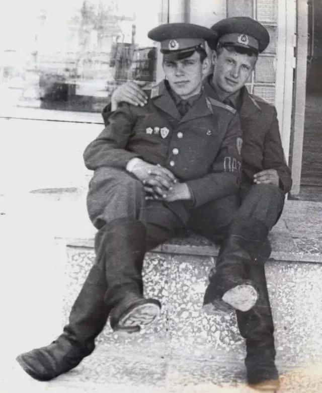 Two Soviet soldiers pose for a photograph; comrades in arms, 1970. [640×781]