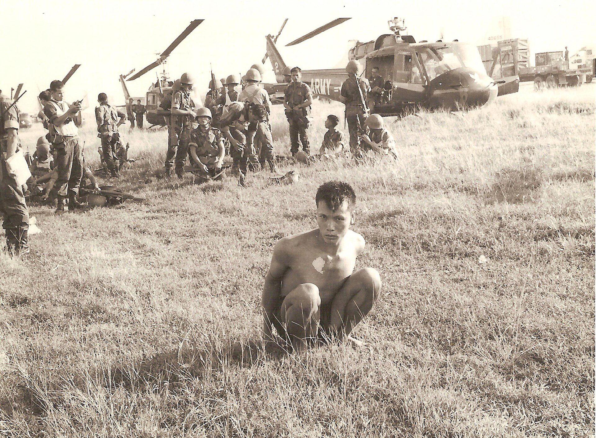 ARVN troops with suspected VC member, 1965. [1920×1412]