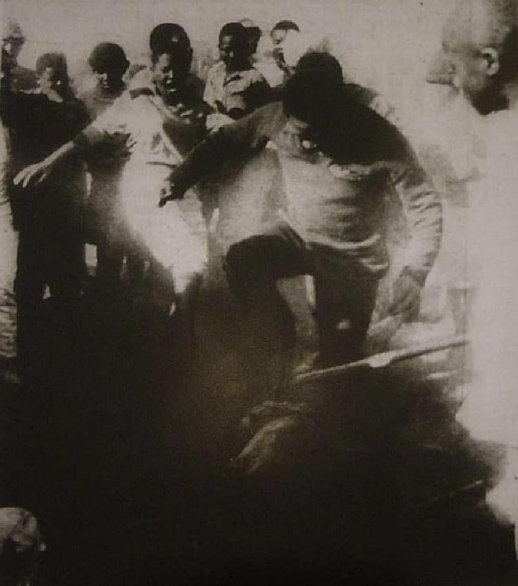 The last moments of Maki Skosana, a South African woman who was burned to death by a mob of anti-apartheid activists after they falsely accused her of being a police informant. Duduza township, July 20, 1985. [752×850]