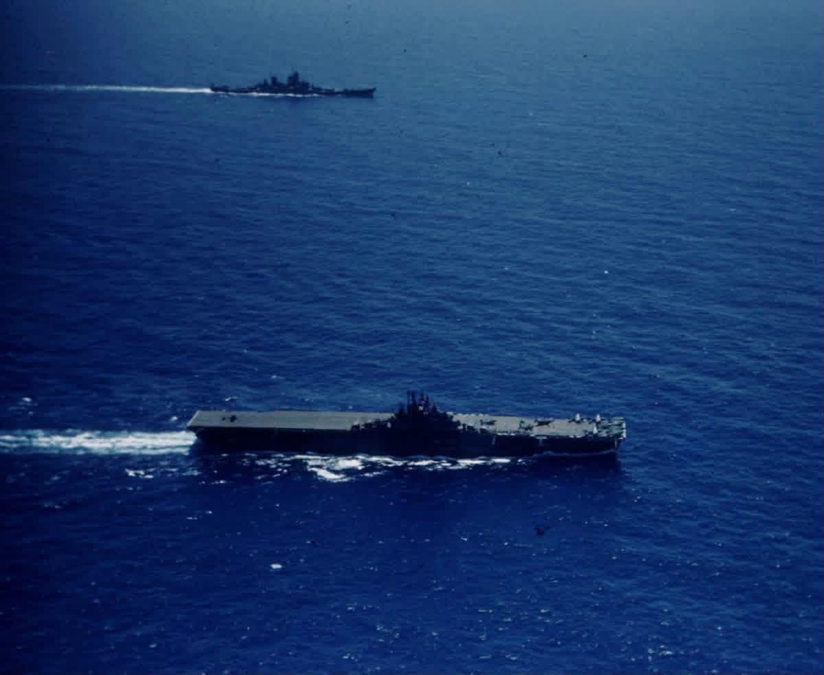 “The Blue Ghost” USS Lexington CV-16 underway with the “The Black Dragon” USS New Jersey BB-62 in the Pacific, 1944. Both were Commissioned in 1943, Decommissioned for the last time in 1991, and both are museum ships today. Original color picture by JR Eyerman, LIFE Magazine. [1200×984]